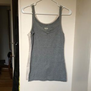 Two lace-accented camisole tops